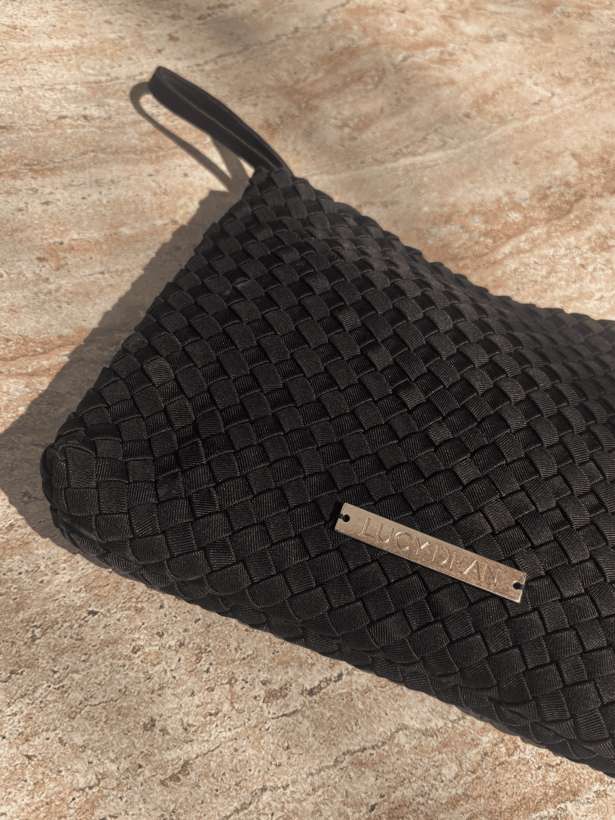 Lucy Dean clutch black detail