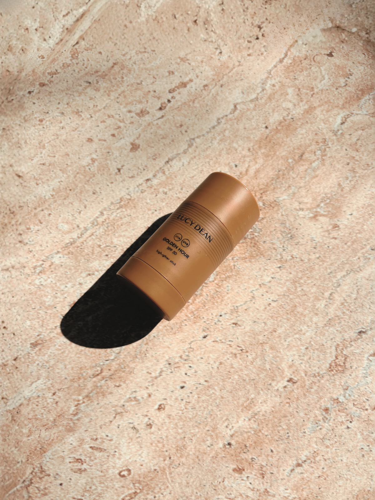 Lucy Dean Golden Hour stick spf 50 flatlay