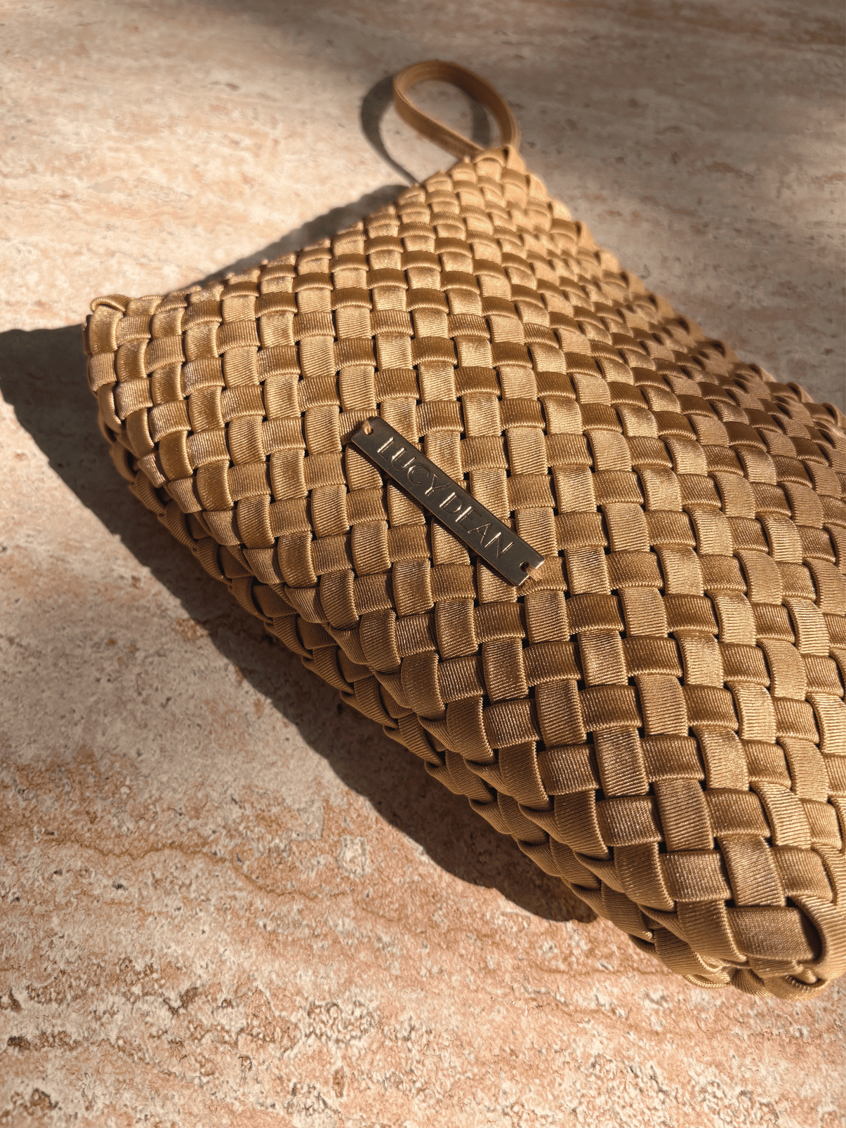 Lucy Dean clutch gold detail